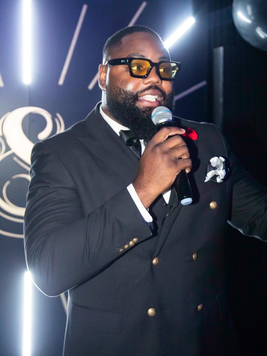 Alex hosting a stage-lit gala, photo 6